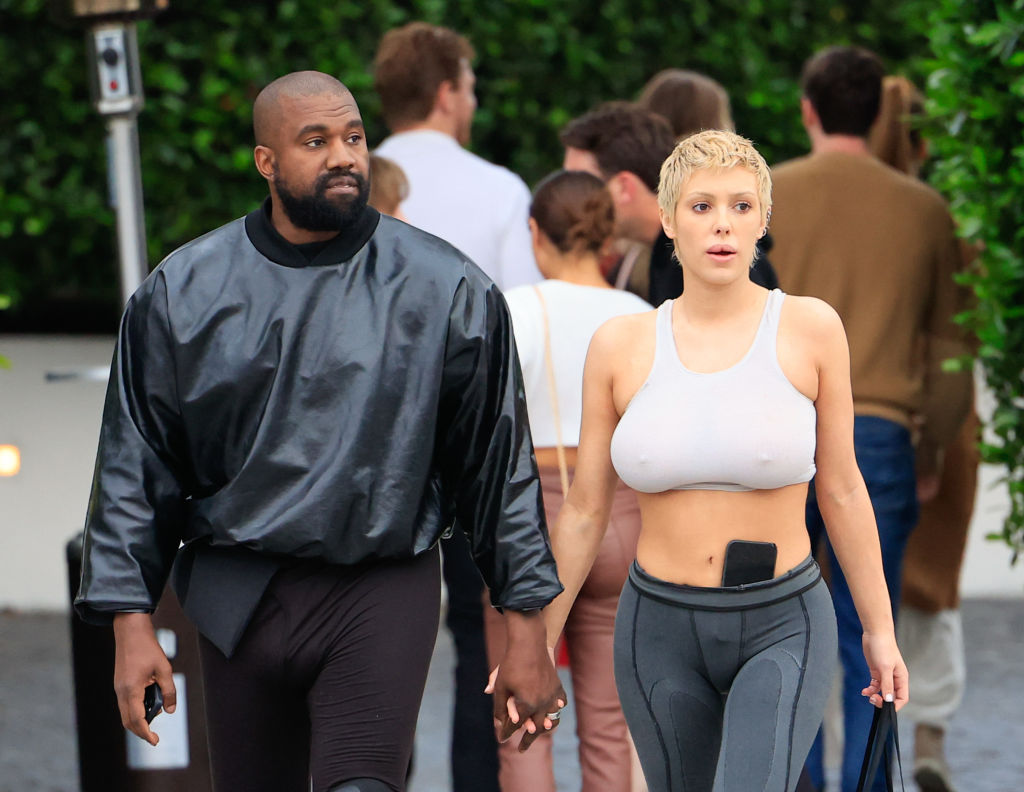Kanye West Grabs 'tmz' Photographer's Camera After Asked About Wife