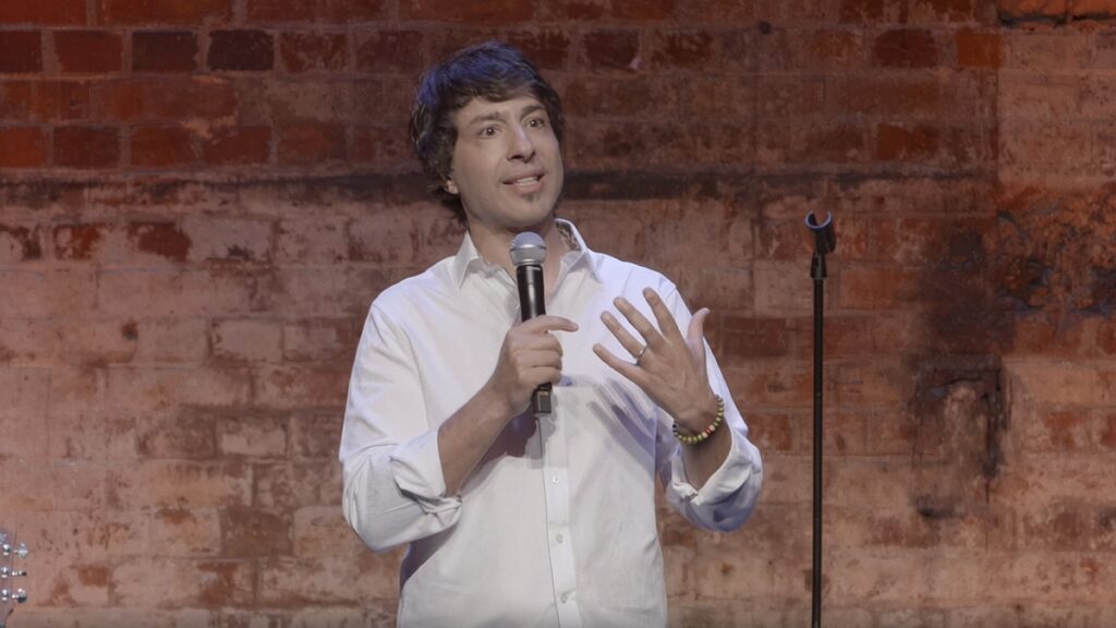 Comedian Arj Barker Defends Decision To Remove Breastfeeding Mother From