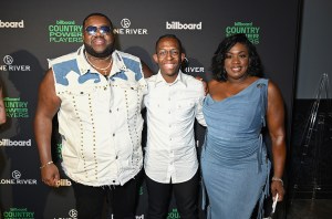 Michael Trotter Jr., Breland and Tanya Trotter at the Billboard Country Power Players held at Gilley's on May 14, 2024 in Dallas, Texas.