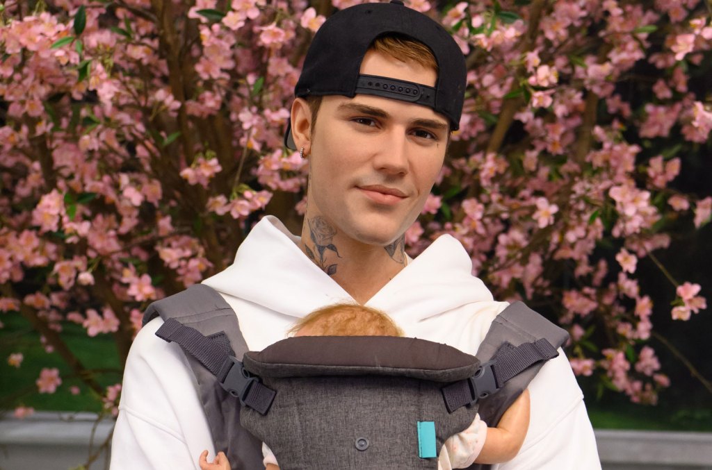 Justin Bieber Wax Figure Wears Baby Carrier At Madame Tussauds