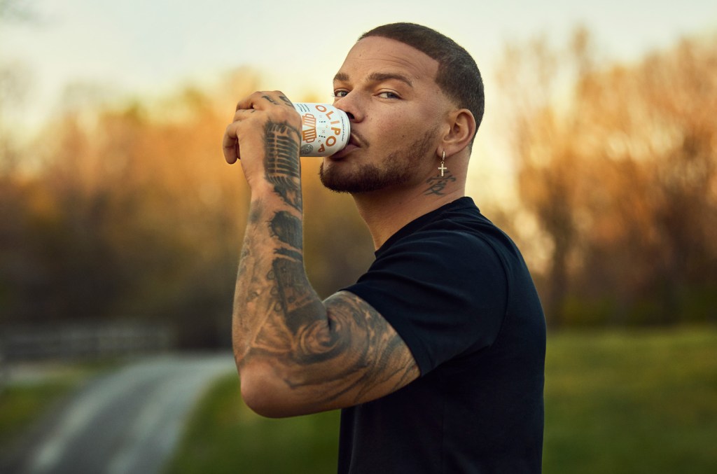 Kane Brown Shares His On The Road Essentials, Including Olipop