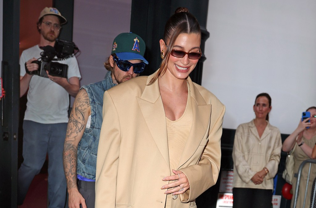 Justin Bieber Holds His Wife Hailey Bieber's Baby In An