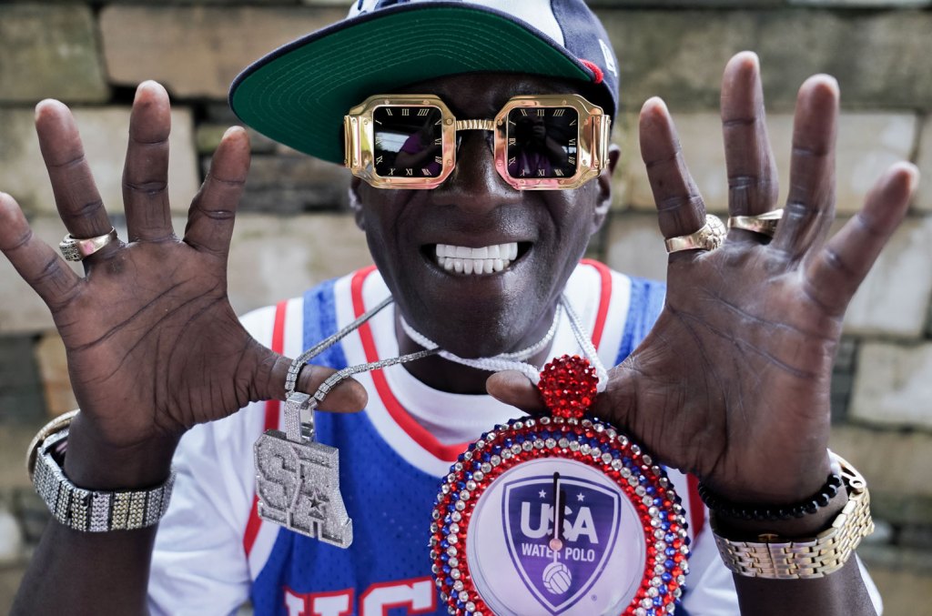 Flavor Flav Keeps Olympic Spirit Burning, Boosts Gofundme For Paralympian's