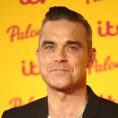 Robbie Williams Urges Fans To Be Compassionate To Celebrities Following