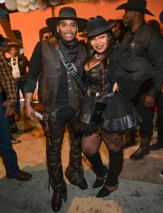 Nelly and Ashanti attend as Nelly celebrates Halloween and her 50th birthday at Guardian Works on October 31, 2024 in Atlanta, Georgia.